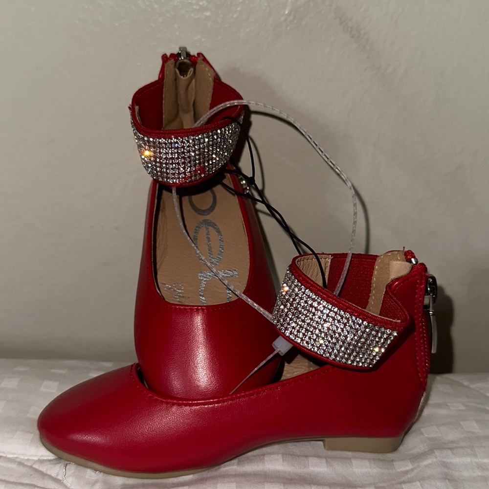 Red BeBe shoes with bling